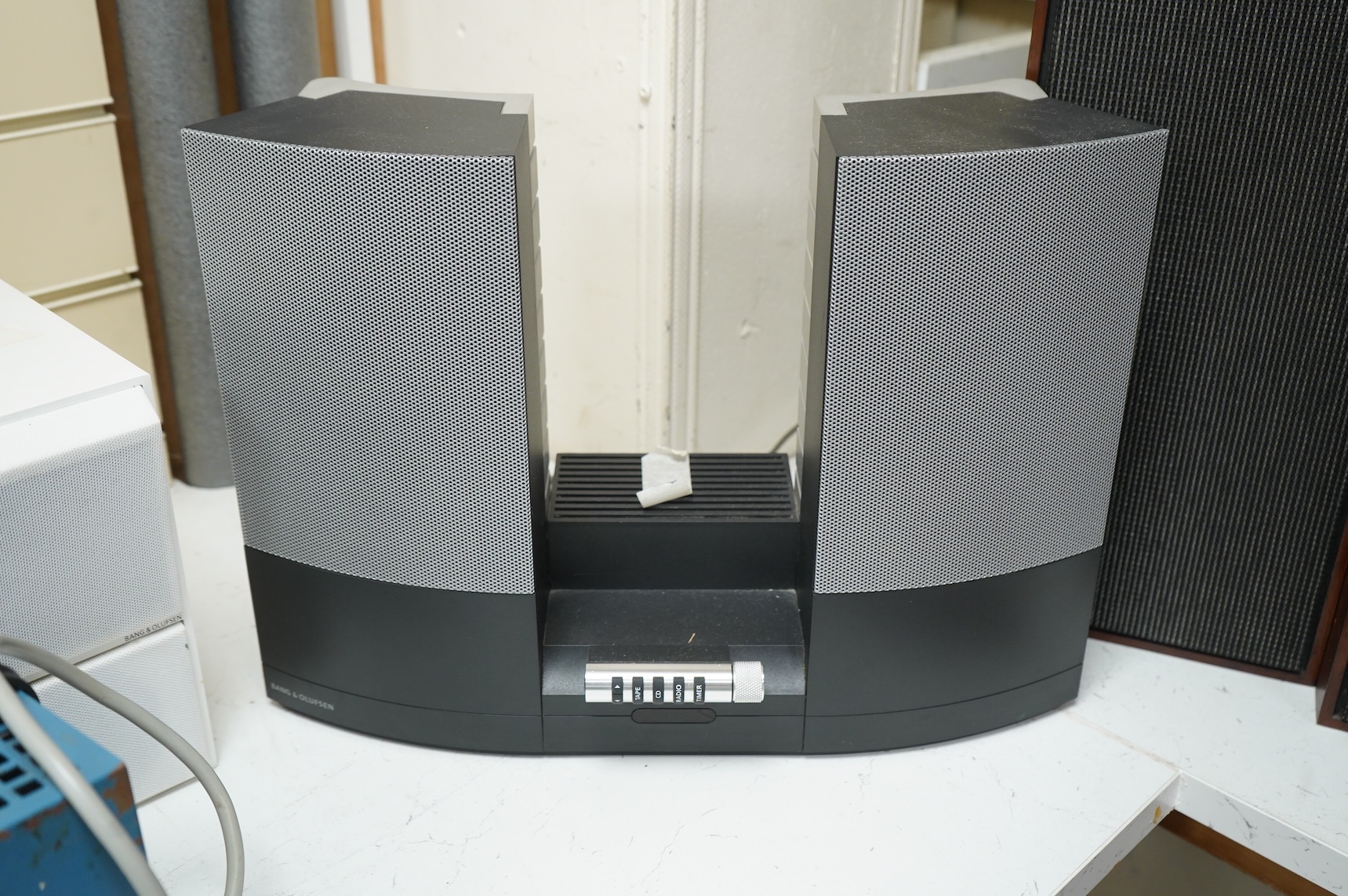 Six Bang & Olufsen items; a 1960s Beolit 600 radio, a pair of Beovox CX50s white cased shelf speakers, a pair of Beovox 1000 speakers, a Beolab 2000 speaker unit, together with two testing units (adjustable power supplie